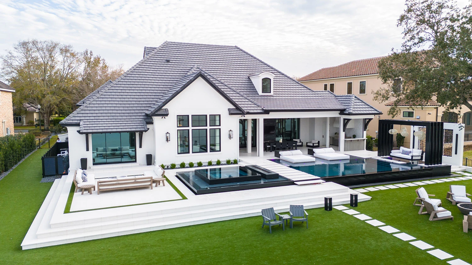 Reflections, back of the home with pool