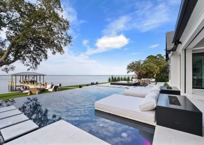 Reflections, pool with lounges