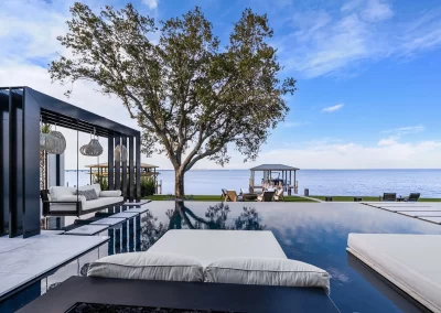 Reflections, pool with lounges
